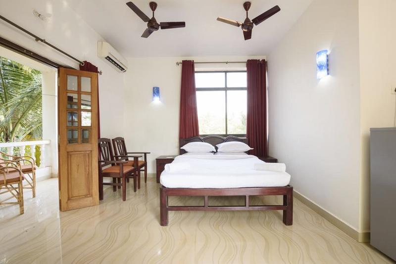 Oyo 13311 The White Feather Hotel Mandrem Dış mekan fotoğraf